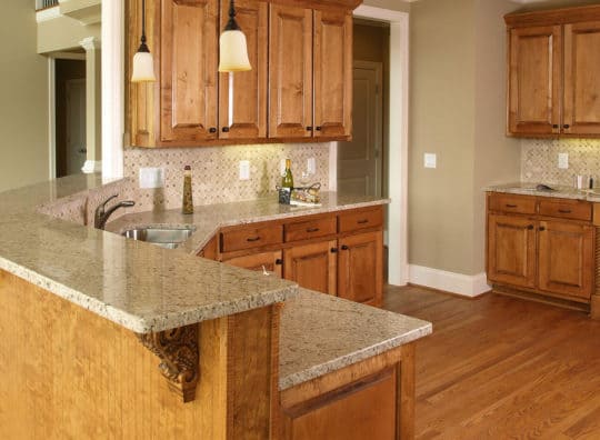 giallo-ornamental-granite-kitchen-countertop-1-540x396.jpg